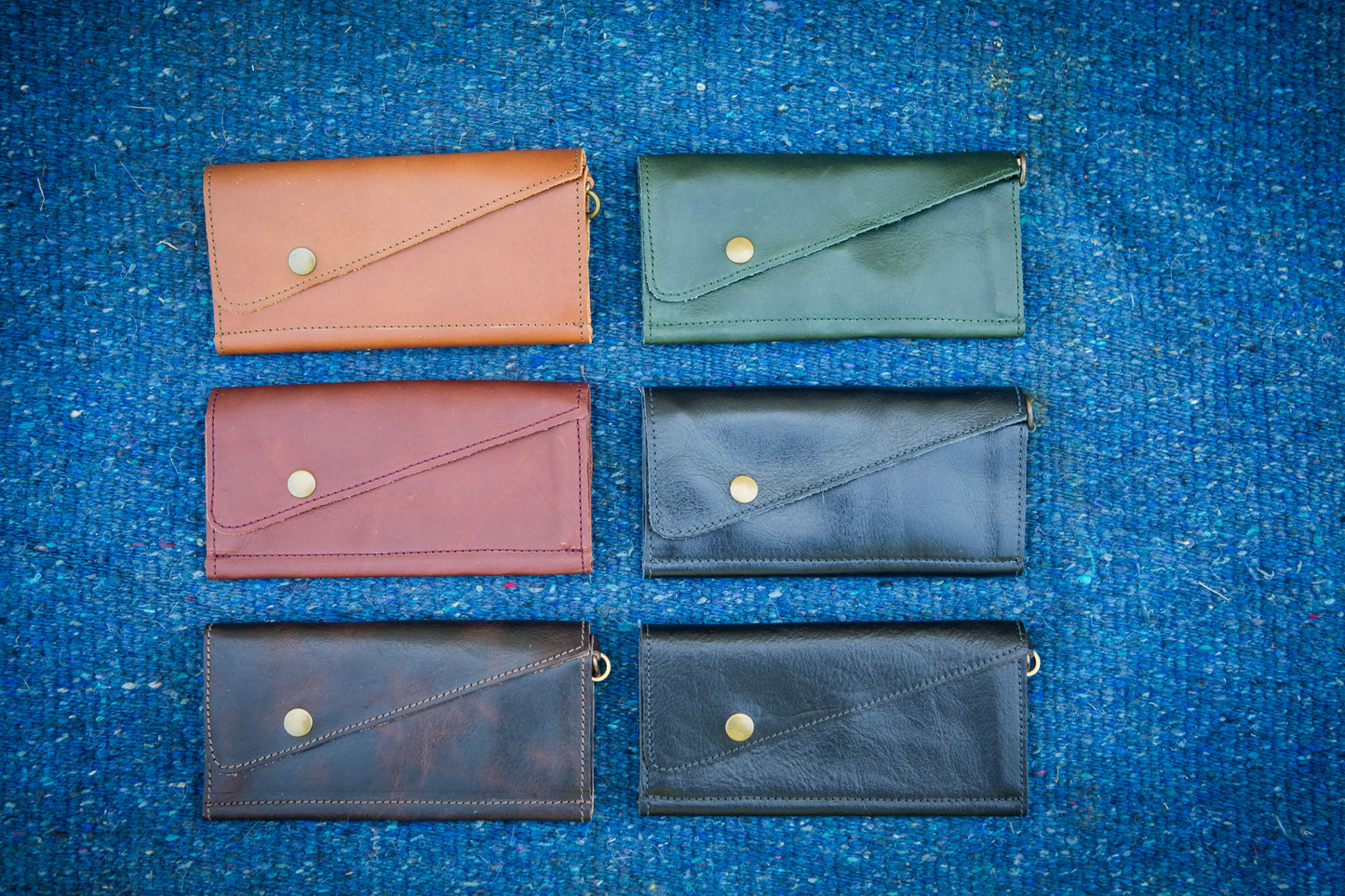 Saddler tri-fold wristlet