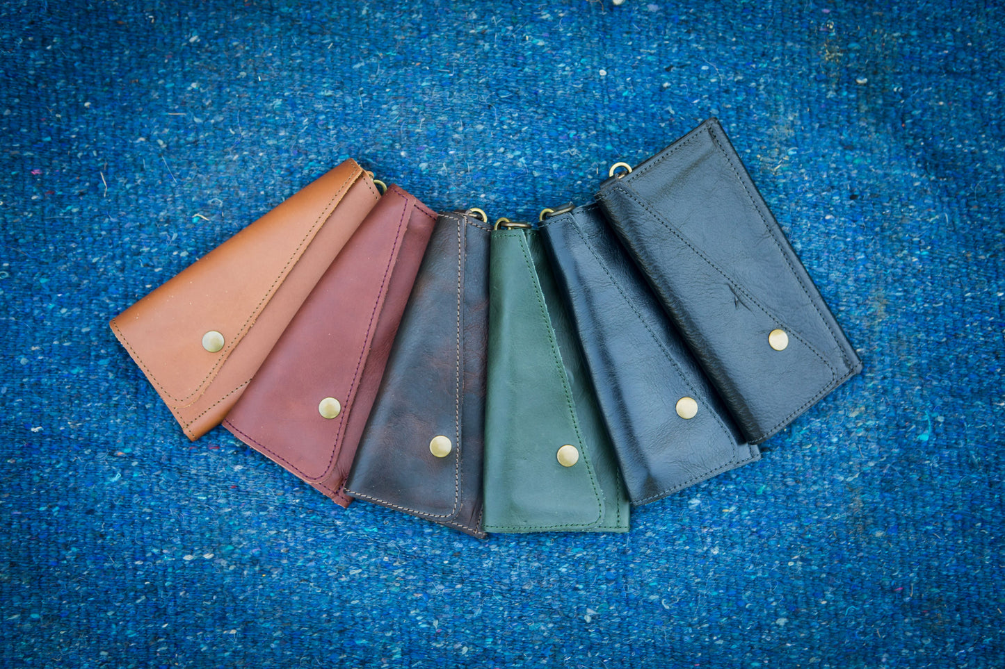 Saddler tri-fold wristlet