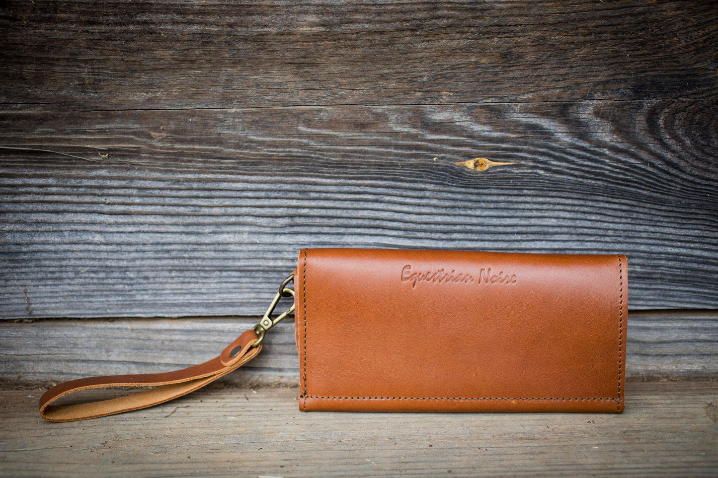 Saddler tri-fold wristlet