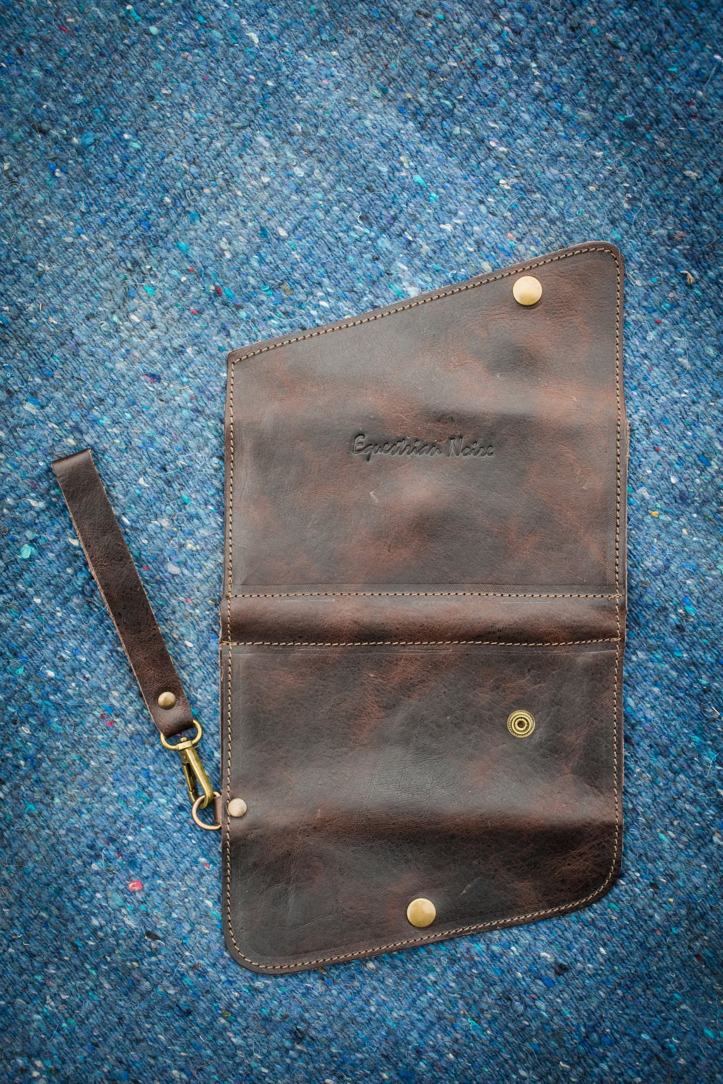 Saddler tri-fold wristlet