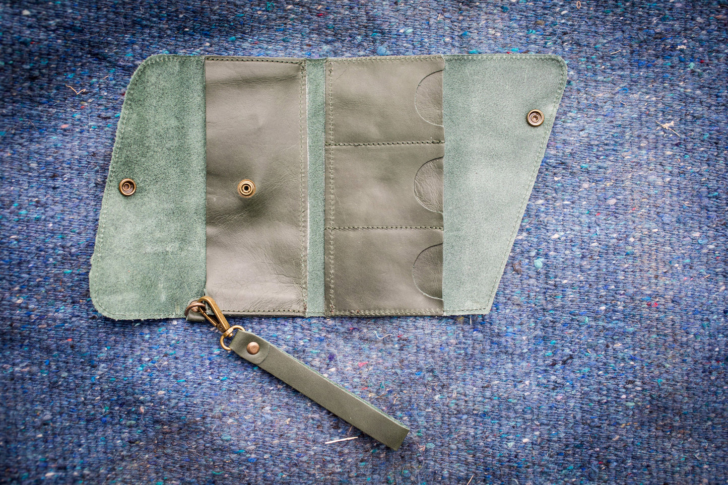 Saddler tri-fold wristlet