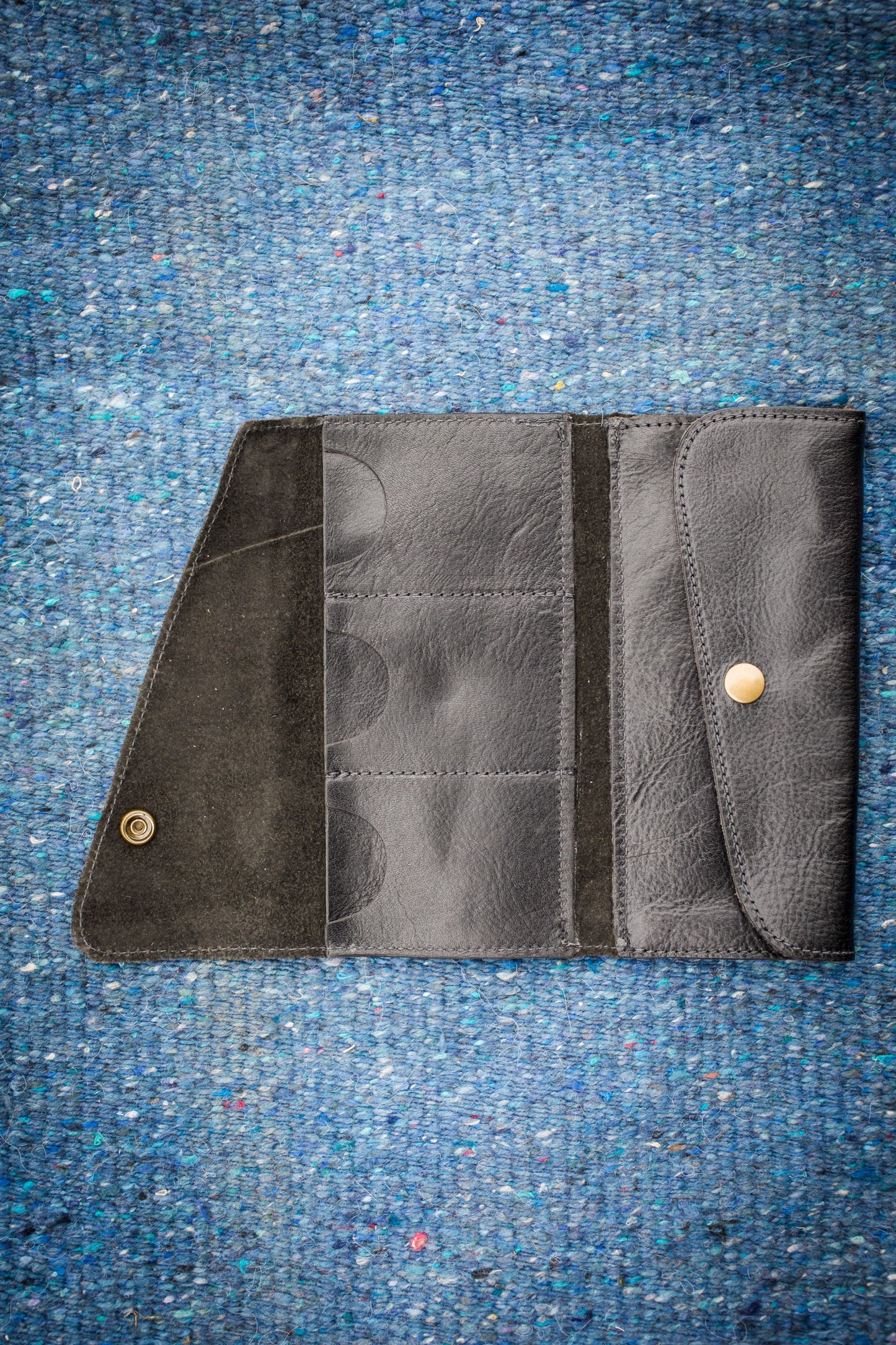 Saddler tri-fold wristlet