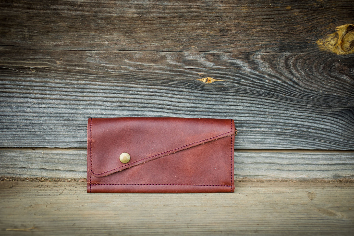 Saddler tri-fold wristlet