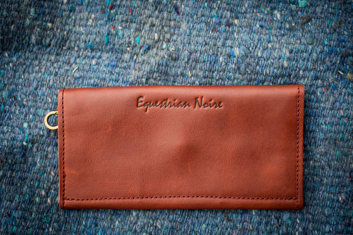 Saddler tri-fold wristlet