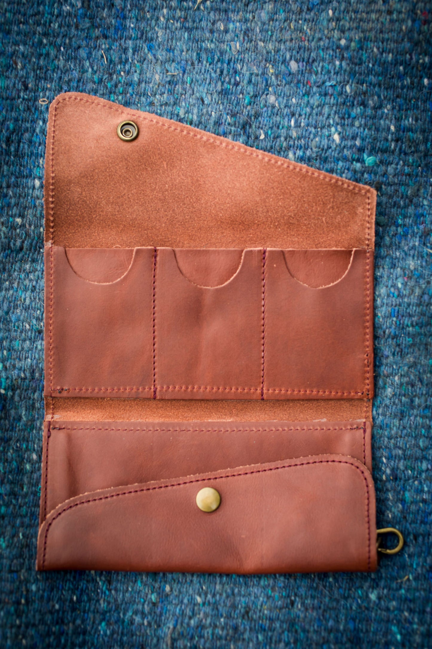 Saddler tri-fold wristlet