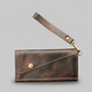 Saddler tri-fold wristlet